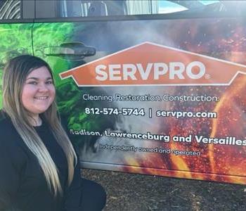 SERVPRO employee, Layla, pictured in front of our van.